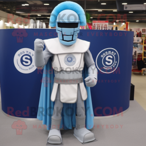 Sky Blue Spartan Soldier mascot costume character dressed with a Henley Tee and Shawl pins