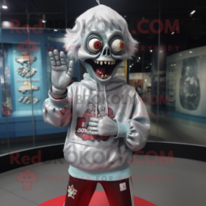 Silver Zombie mascot costume character dressed with a Sweatshirt and Rings