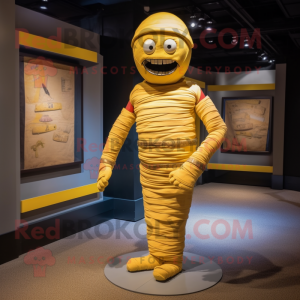 Yellow Mummy mascot costume character dressed with a Romper and Tie pins