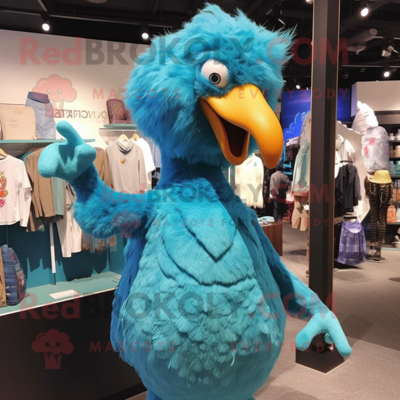 Cyan Dodo Bird mascot costume character dressed with a Jumpsuit and Brooches Cyan Dodo Bird mascot costume character dressed with a Jumpsuit and Brooches