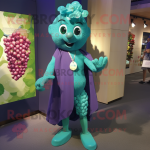 Turquoise Grape mascot costume character dressed with a Graphic Tee and Necklaces