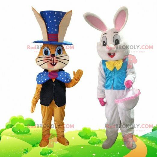 2 mascotes coelhos vestidos com roupas festivas - Redbrokoly.com
