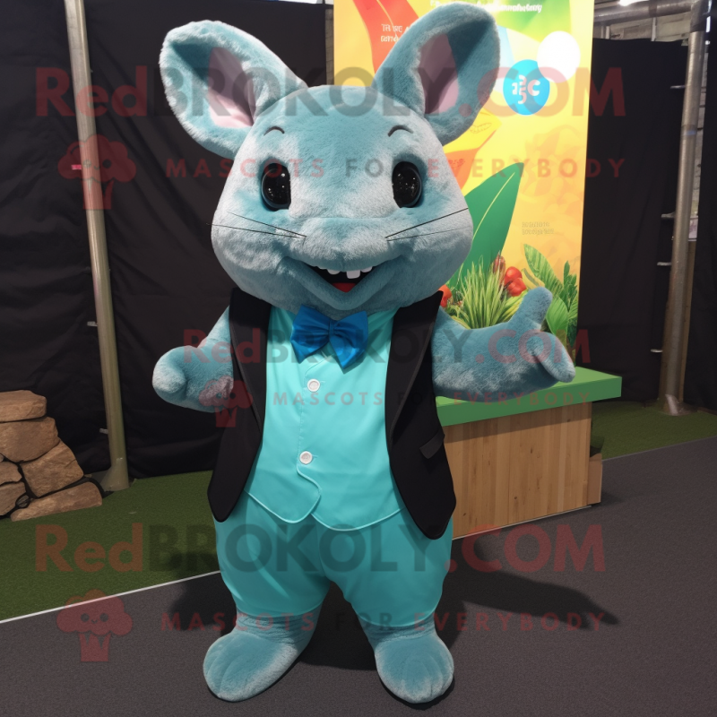 Turquoise Chinchilla mascot costume character dressed with a Suit and Shoe clips Turquoise Chinchilla mascot costume character dressed with a Suit and Shoe clips
