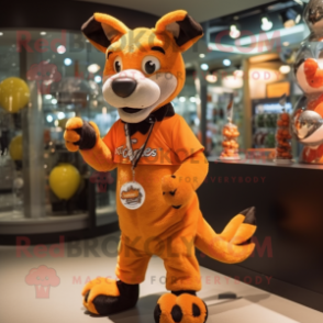 Orange Thylacosmilus mascot costume character dressed with a Mini Dress and Keychains
