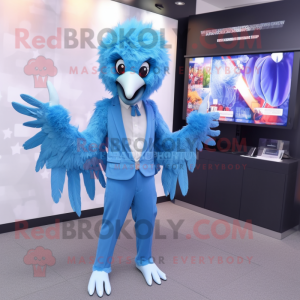 Sky Blue Harpy mascot costume character dressed with a Suit Pants and Digital watches