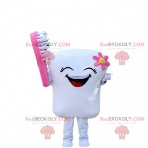 Lachende tand mascotte met een tandenborstel, tandarts kostuum