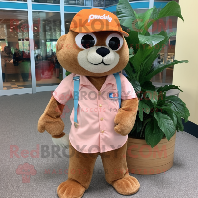 Peach Jaguarundi mascot costume character dressed with a Bermuda Shorts and Hat pins Peach Jaguarundi mascot costume character dressed with a Bermuda Shorts and Hat pins