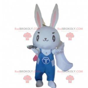 Mascotte de lapin blanc avec une combinaison bleue -