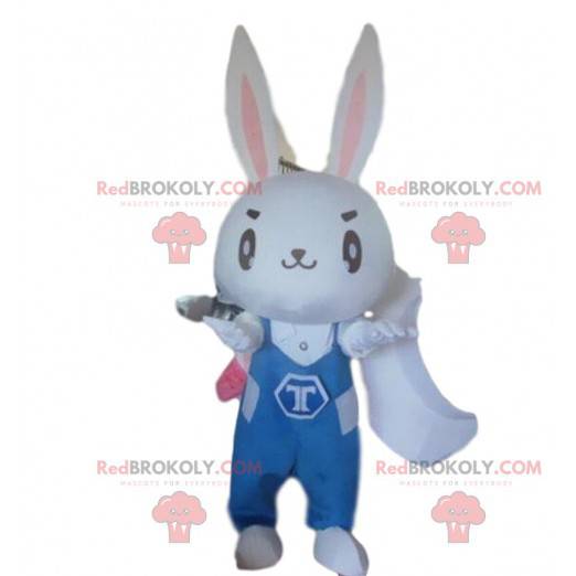 Mascotte de lapin blanc avec une combinaison bleue -