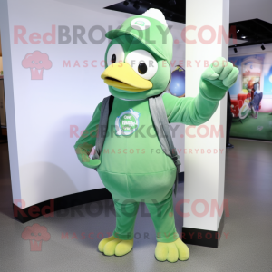 Green Penguin mascot costume character dressed with a Bootcut Jeans and Watches