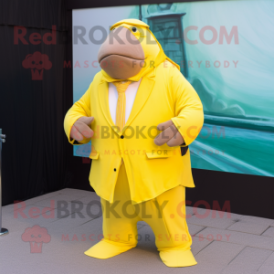 Lemon Yellow Walrus mascot costume character dressed with a Vest and Pocket squares