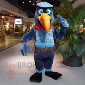 Navy Toucan mascot costume character dressed with a Denim Shirt and Gloves