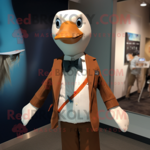 Rust Albatross mascot costume character dressed with a Oxford Shirt and Bow ties