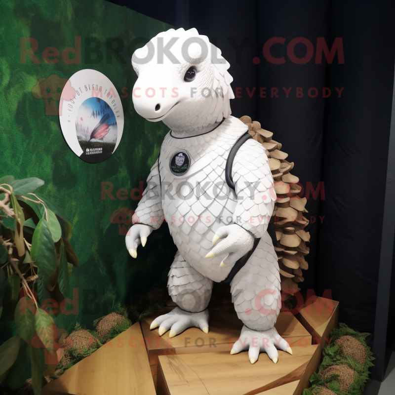 White Pangolin mascot costume character dressed with a Rash Guard and Keychains White Pangolin mascot costume character dressed with a Rash Guard and Keychains