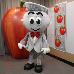 Silver Tomato mascot costume character dressed with a Sweater and Bow ties