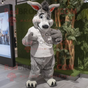 Gray Donkey mascot costume character dressed with a Dress Shirt and Digital watches
