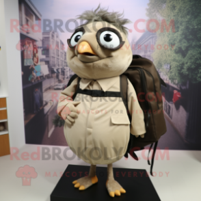 Beige Blackbird mascot costume character dressed with a Blouse and Backpacks
