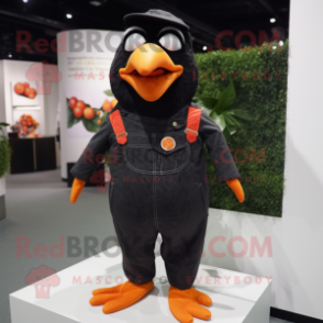 Peach Blackbird mascot costume character dressed with a Overalls and Cufflinks