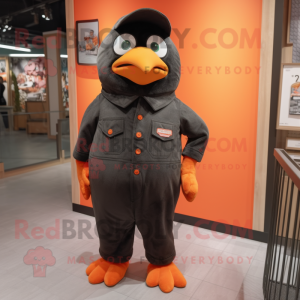Peach Blackbird mascot costume character dressed with a Overalls and Cufflinks