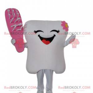 Mascote de dente branco com uma escova rosa, fantasia de dente