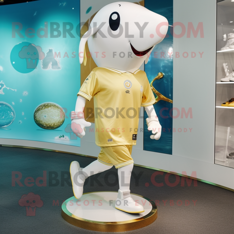 Gold Beluga Whale mascot costume character dressed with a Running Shorts and Anklets