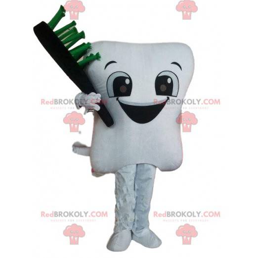 Hvit tann maskot med en tannbørste, gigantisk tann -