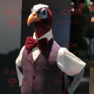 Maroon Guinea Fowl mascot costume character dressed with a Tank Top and Bow ties