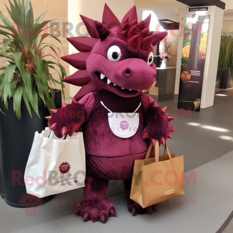 Maroon Stegosaurus mascot costume character dressed with a Evening Gown and Tote bags