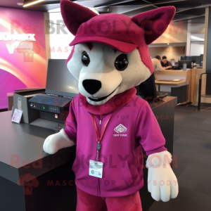 Magenta Dingo mascot costume character dressed with a Blouse and Beanies