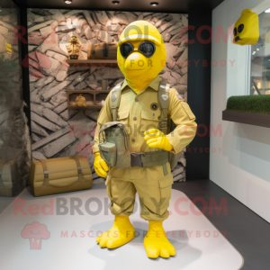 Yellow Special Air Service mascot costume character dressed with a Cargo Shorts and Messenger bags