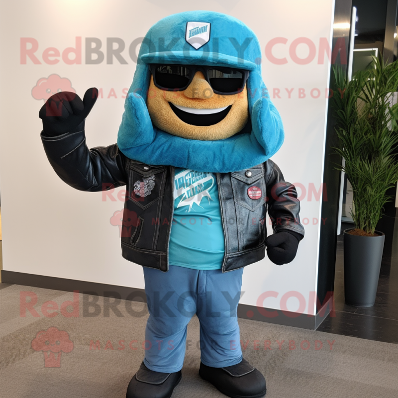 Turquoise Lasagna mascot costume character dressed with a Biker Jacket and Hat pins Turquoise Lasagna mascot costume character dressed with a Biker Jacket and Hat pins