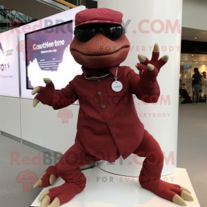 Maroon Lizard mascot costume character dressed with a Trousers and Smartwatches