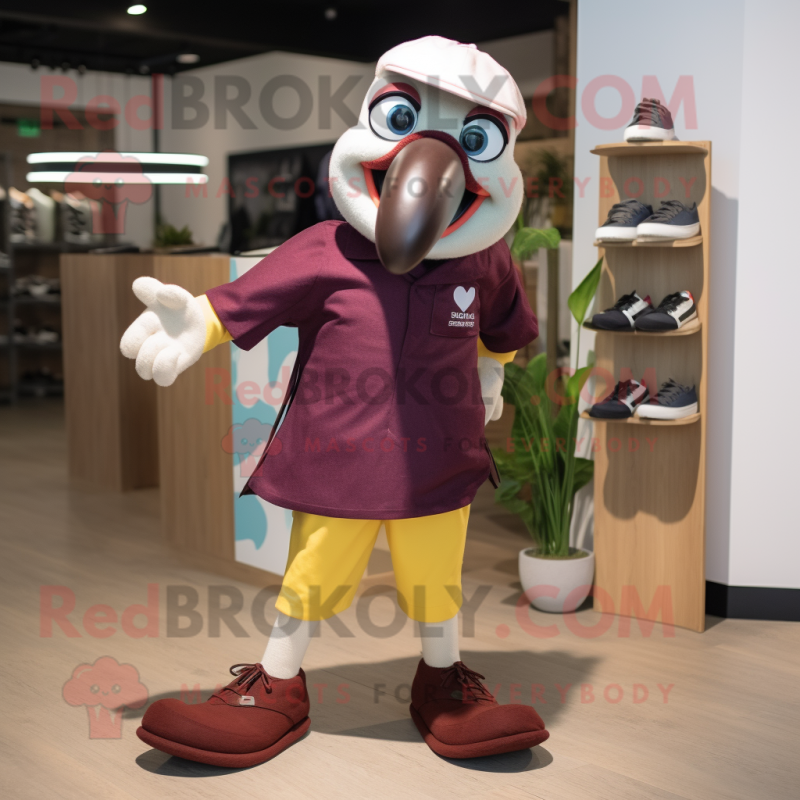 Maroon Toucan mascot costume character dressed with a Oxford Shirt and Foot pads Maroon Toucan mascot costume character dressed with a Oxford Shirt and Foot pads