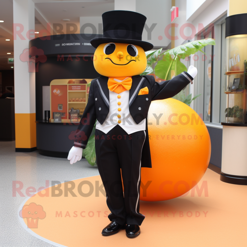 Orange Mango mascot costume character dressed with a Tuxedo and Shoe clips Orange Mango mascot costume character dressed with a Tuxedo and Shoe clips