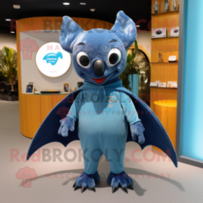 Blue Fruit Bat mascot costume character dressed with a Jumpsuit and Mittens