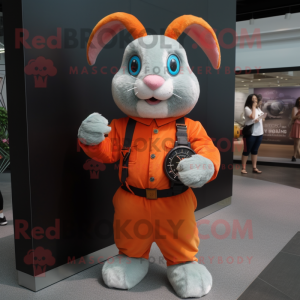 Orange Rabbit mascot costume character dressed with a Romper and Bracelet watches