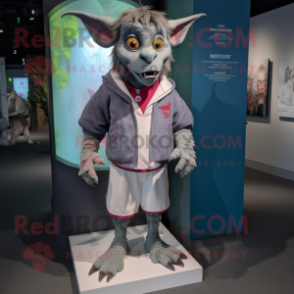 nan Gargoyle mascot costume character dressed with a Bermuda Shorts and Lapel pins