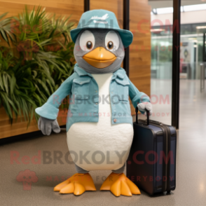 Teal Penguin mascot costume character dressed with a Chambray Shirt and Briefcases