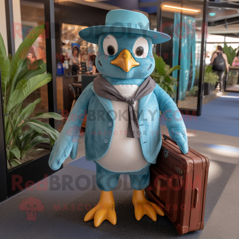 Teal Penguin mascot costume character dressed with a Chambray Shirt and Briefcases