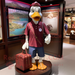 Maroon Muscovy Duck mascot costume character dressed with a Polo Tee and Messenger bags