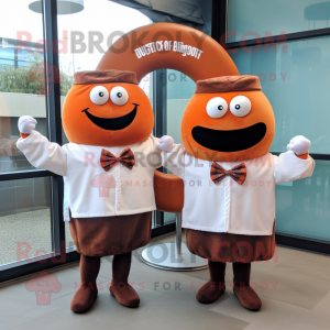 Rust Bagels mascot costume character dressed with a Poplin Shirt and Bow ties