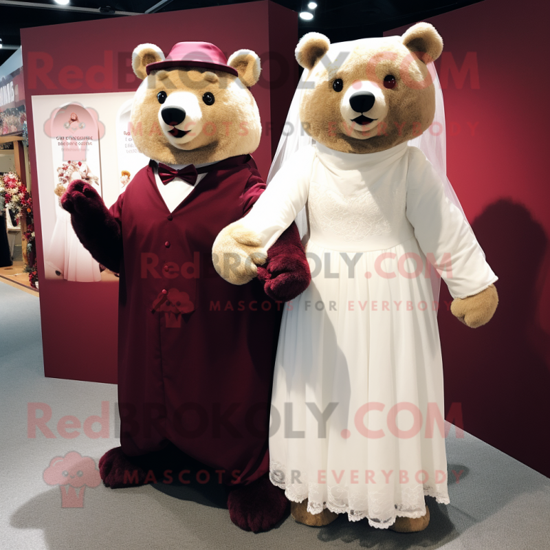 Maroon Bear mascot costume character dressed with a Wedding Dress and Wraps Maroon Bear mascot costume character dressed with a Wedding Dress and Wraps
