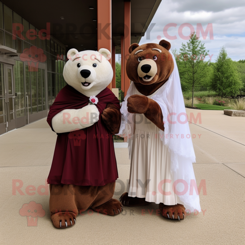 Maroon Bear mascot costume character dressed with a Wedding Dress and Wraps Maroon Bear mascot costume character dressed with a Wedding Dress and Wraps