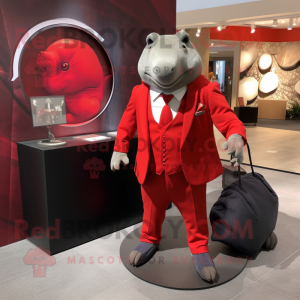 Red Glyptodon mascot costume character dressed with a Blazer and Clutch bags