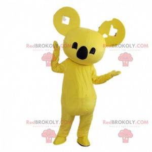 Mascote coala amarelo, traje exótico, animal asiático -