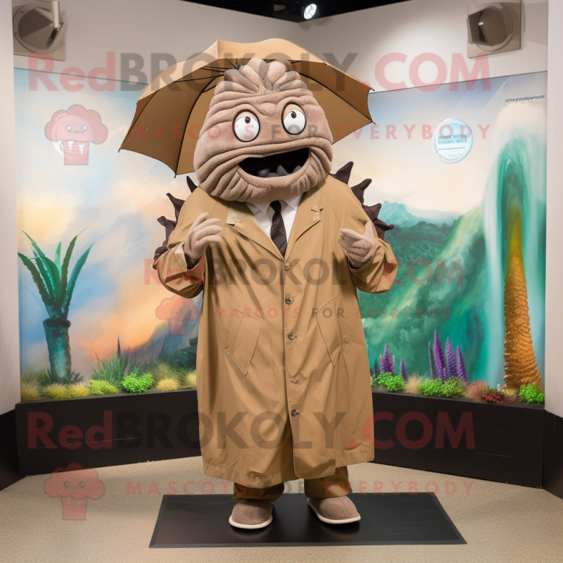 Brown Trilobite mascot costume character dressed with a Raincoat and Tie pins