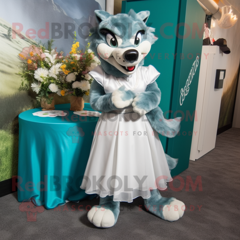 Teal Wolf mascot costume character dressed with a Wedding Dress and Shoe clips Teal Wolf mascot costume character dressed with a Wedding Dress and Shoe clips