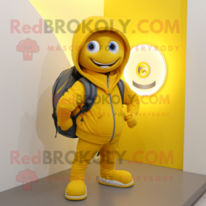 Yellow Superhero mascot costume character dressed with a Hoodie and Backpacks