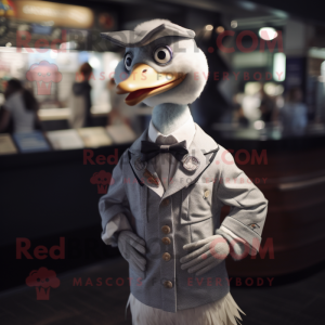 Silver Geese mascot costume character dressed with a Oxford Shirt and Cufflinks