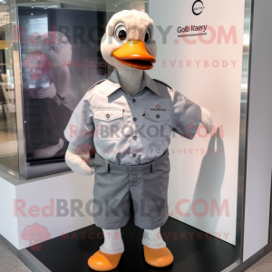 Silver Geese mascot costume character dressed with a Oxford Shirt and Cufflinks